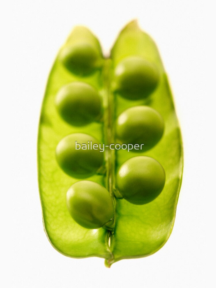 Peas in an open pod white background by bailey-cooper