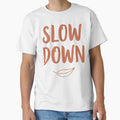 Handwritten  Slow Down  lettering with a simple leaf icon on a white background, a minimal motivational quote promoting mindfulness, relaxation by Dejbar