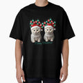 Two Scottish Fold kittens wearing Christmas hats by vuslatmedia