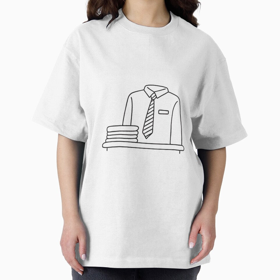 A tie draped over a chair beside a folded shirt by rasagamastore